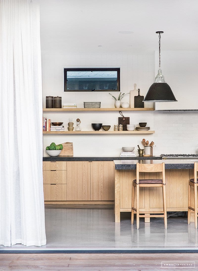 a modern, bright kitchen designed by amber interiors design and shot by tessa neustadt photography.