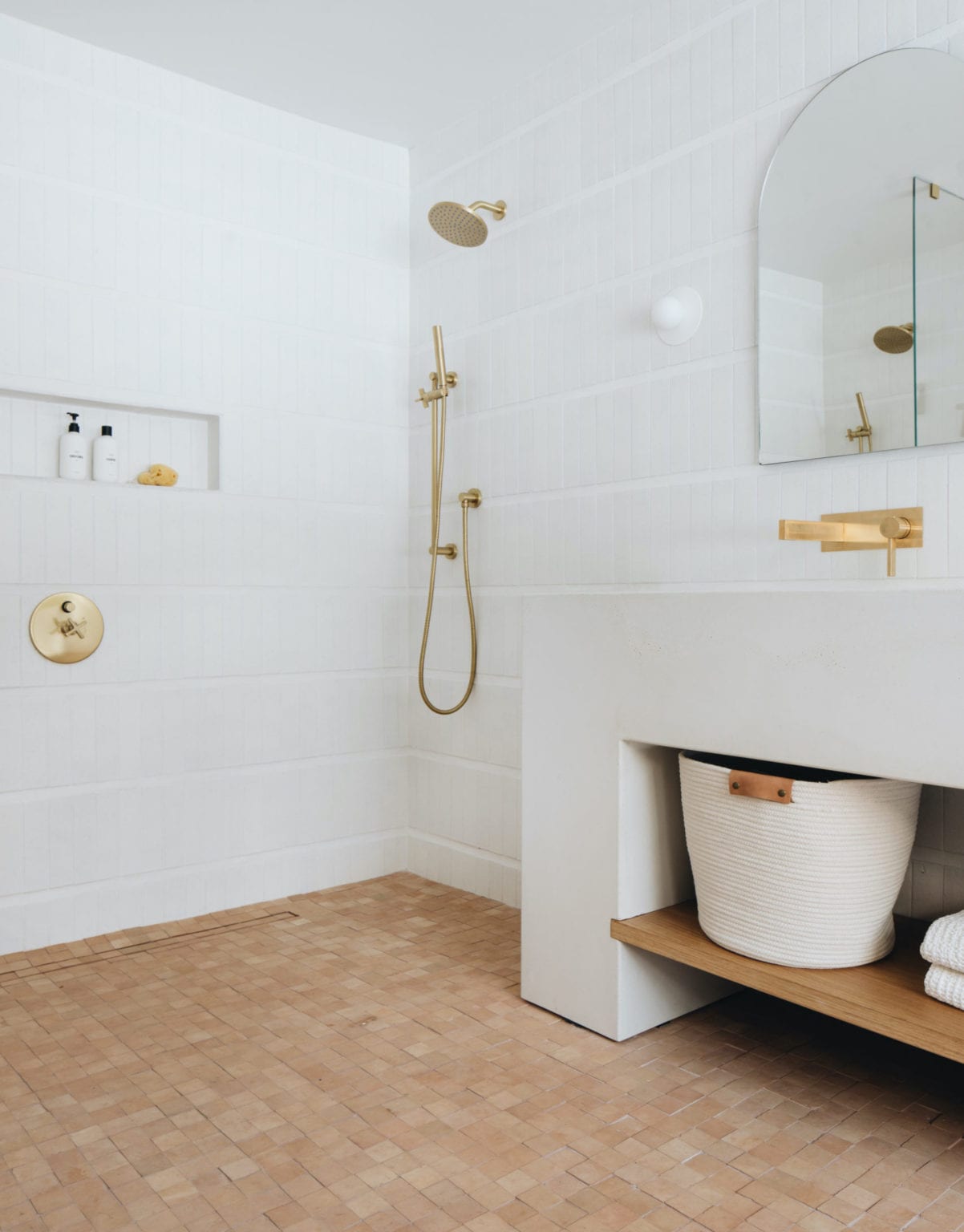 sarah sherman samuel bathroom with clé tile zellige unglazed terracotta natural 2x2 square tiles on the floor