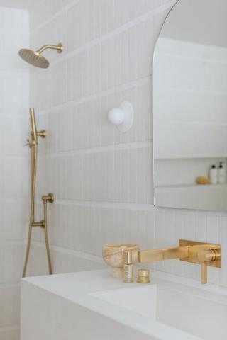 sarah sherman samuel bathroom with clé tile modern farmhouse brick matte white on the backsplash wall